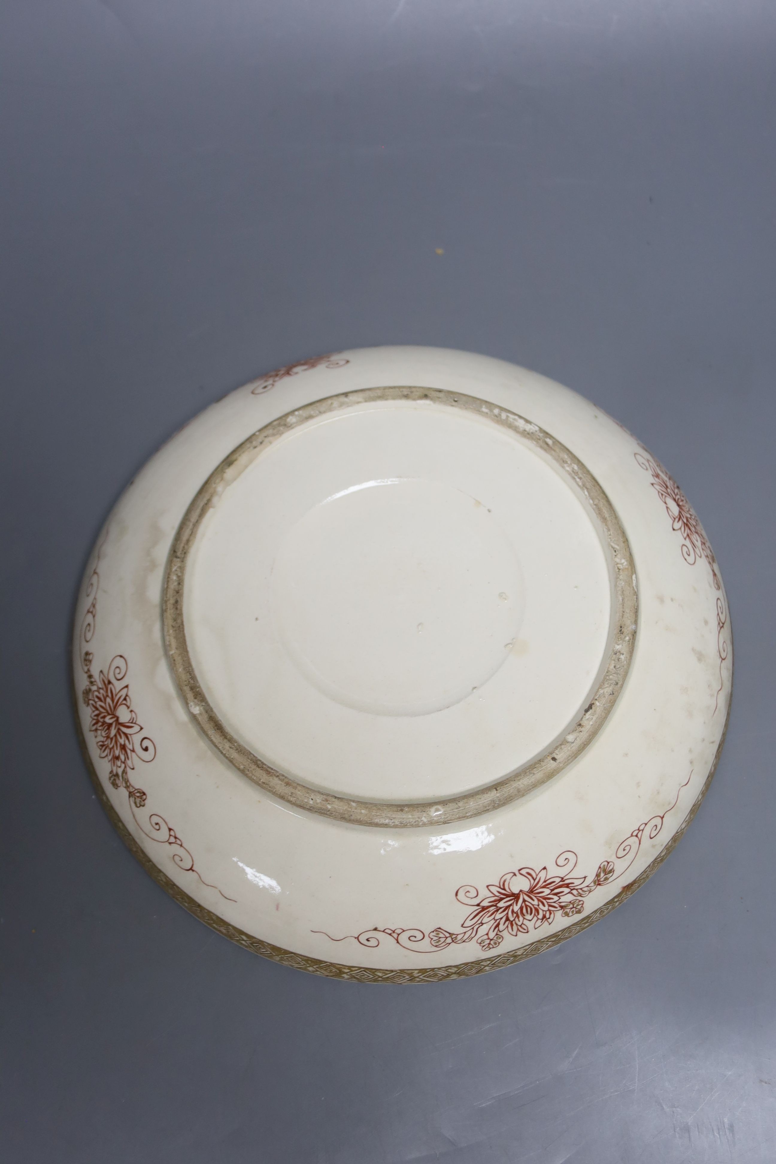 A late 19th century Japanese Satsuma box and cover, painted and gilded throughout, 23cm diameter